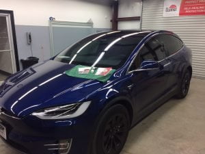 Blue Tesla with Window Tinting