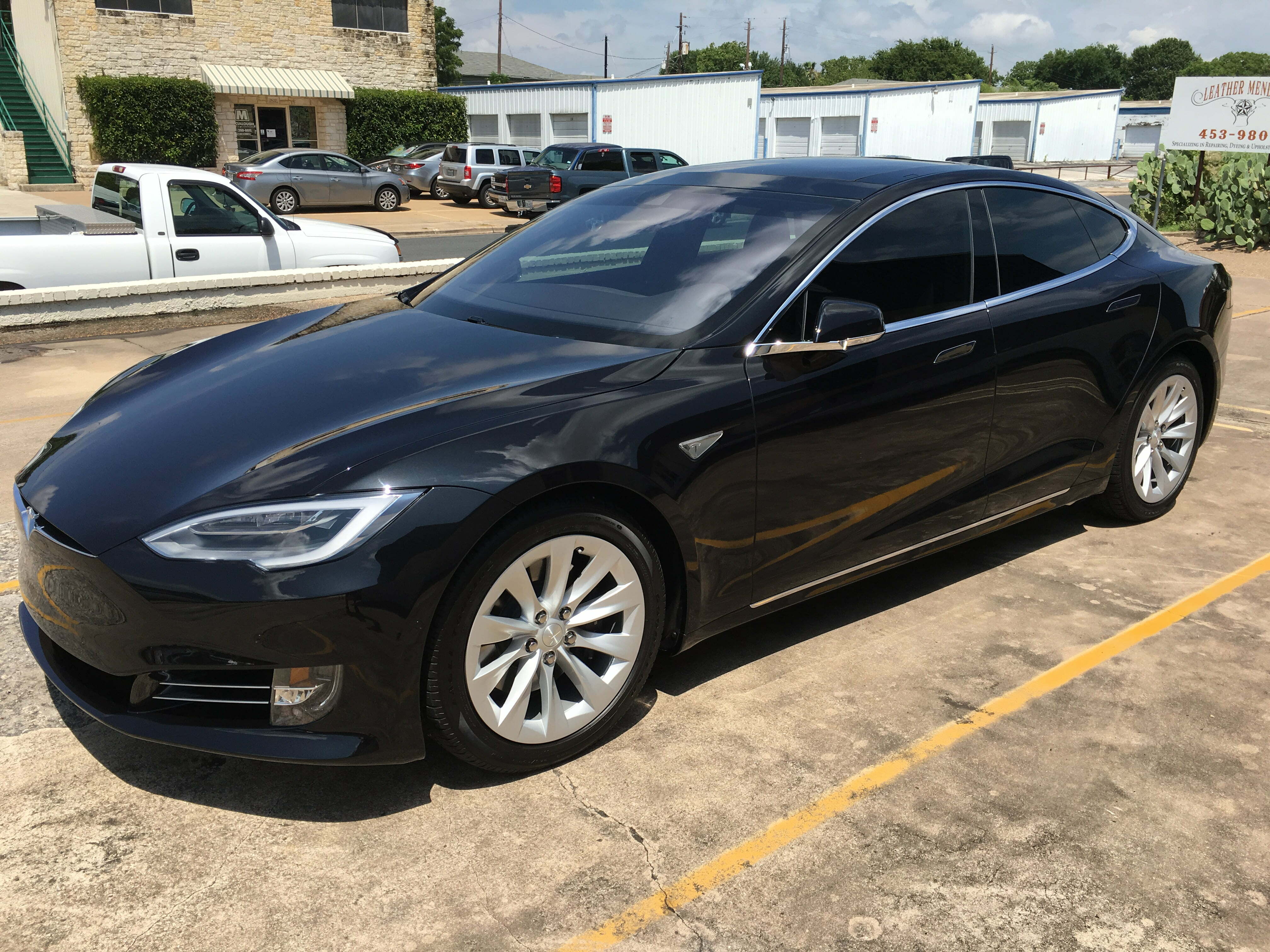 black tesla with window tint